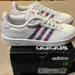 Adidas white sneakers with pink floral print on the strips